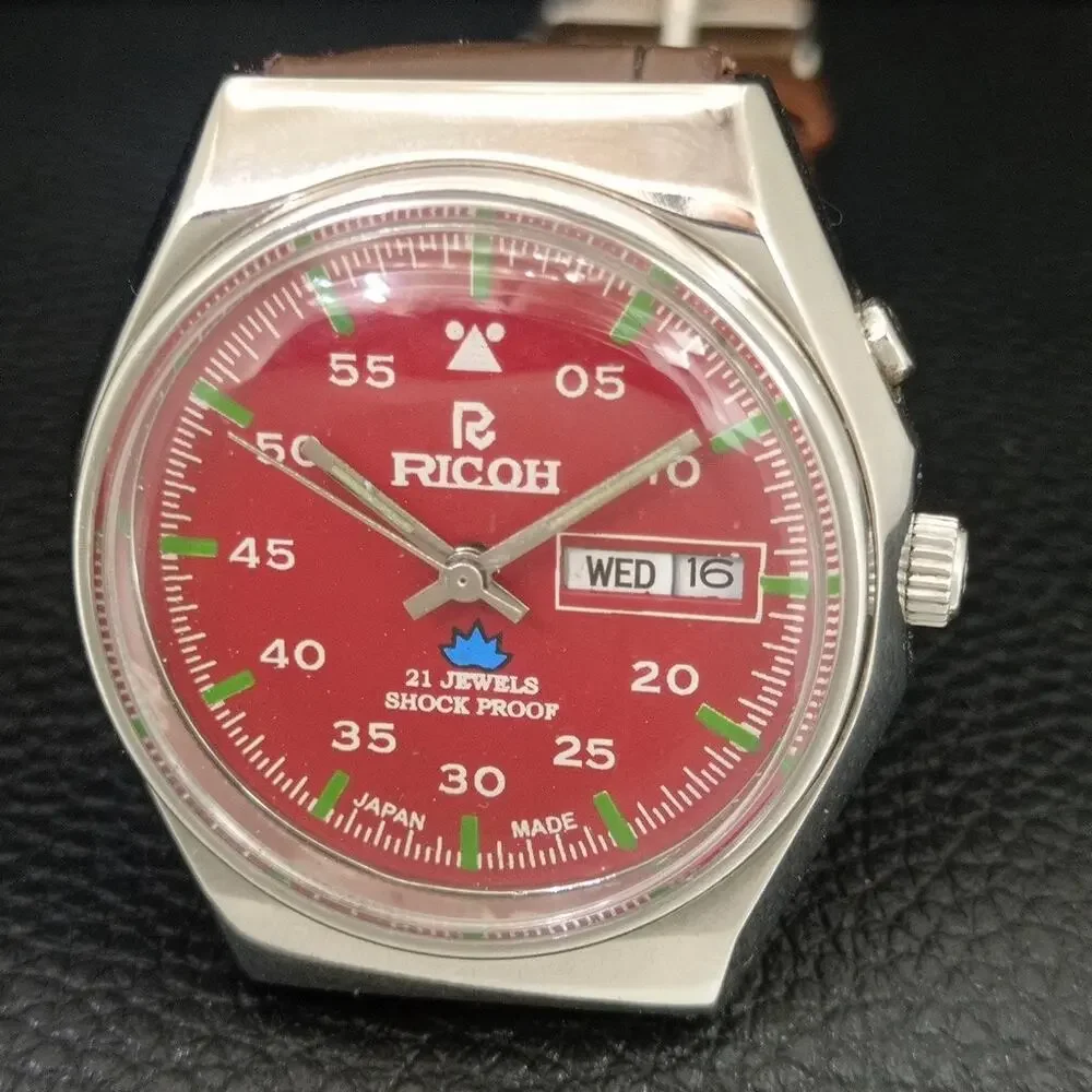 Vintage 1971 Ricoh Automatic Mens Silver Watch W/daydate & Red accents